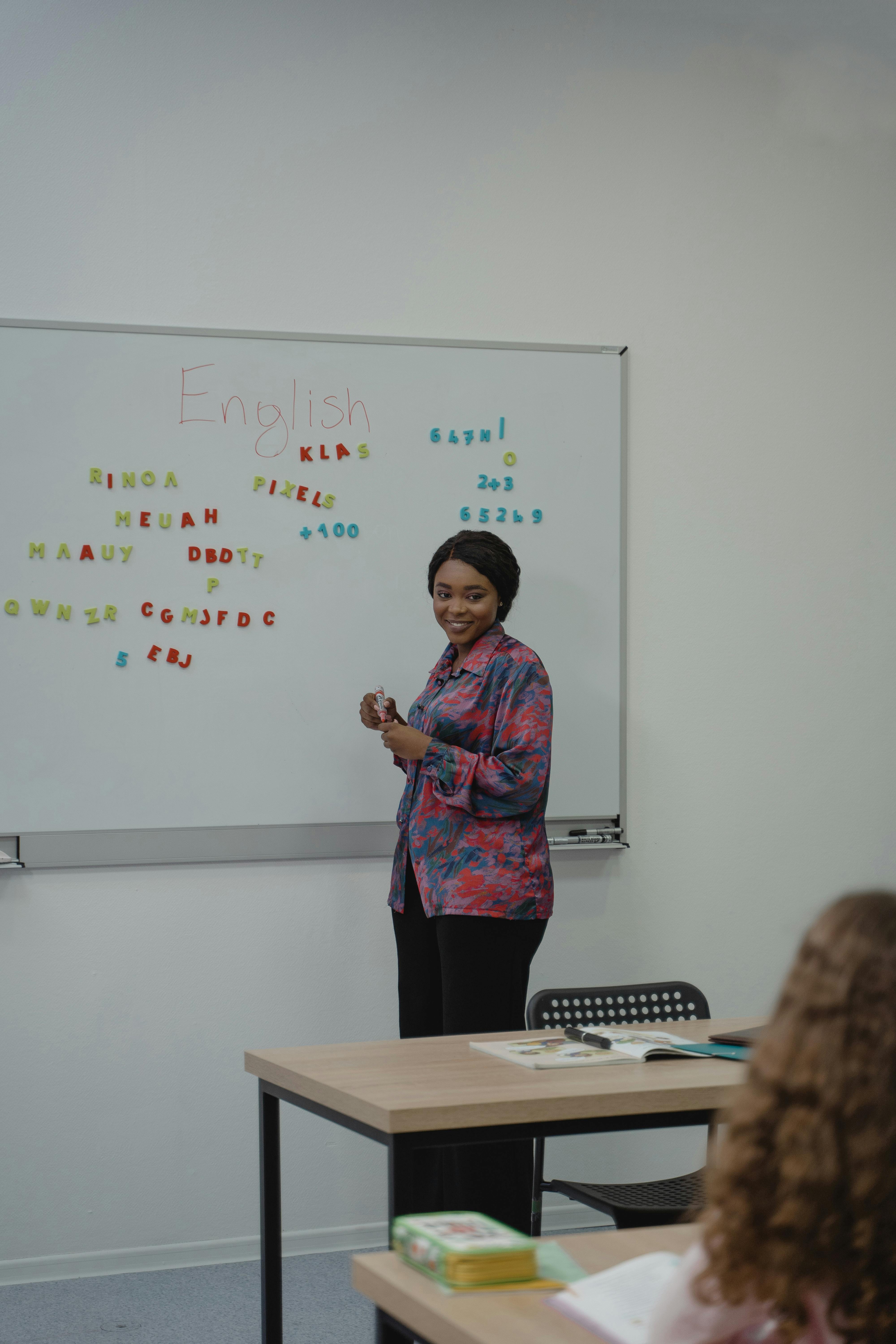 LingoUp Academy classroom with students and a native teacher